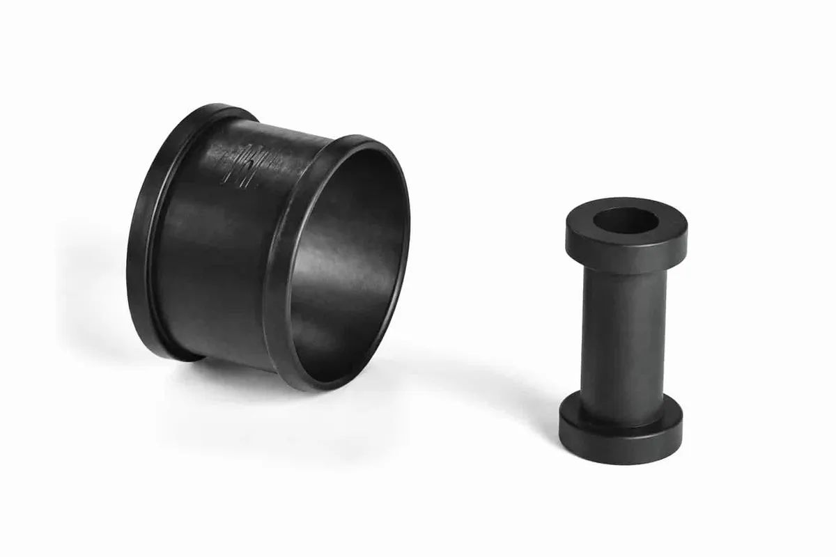 Helashrink locating bushes used for cable location, cushioning, and protection at bulkhead and enclosure entry points